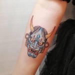 popular colored japanese mask tattoo 